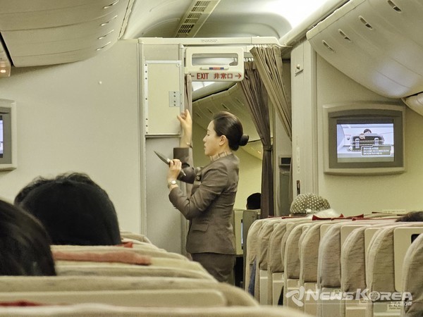 설날 연휴에 마닐라에서 출발하는 아시아나항공  OZ704편의 승무원들이 이륙을 준비하고 있다., @뉴스코리아 최신 특파원