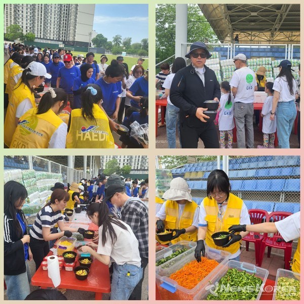 ▲타슈켄트 야까샤라이 스타디움에서 열린 한인회 체육대회에서 참가자들이 준비된 비빔밥을 받아가고 있다. 행사 관계자들과 봉사자들이 정성껏 식사를 준비하며 따뜻한 분위기를 더했다. @뉴스코리아 신현권 특파원